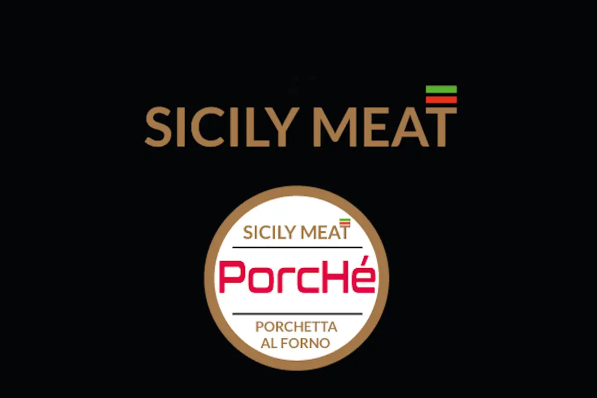 Produzione porchetta artigianale Porchè nel laboratorio Sicily Meat a Palermo